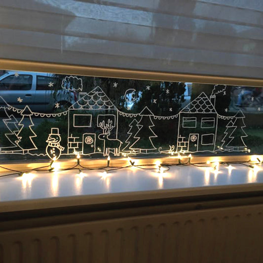 Winter wonderland landschap raamtekening