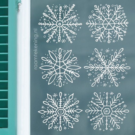 Sierlijke sneeuwvlokken raamtekening